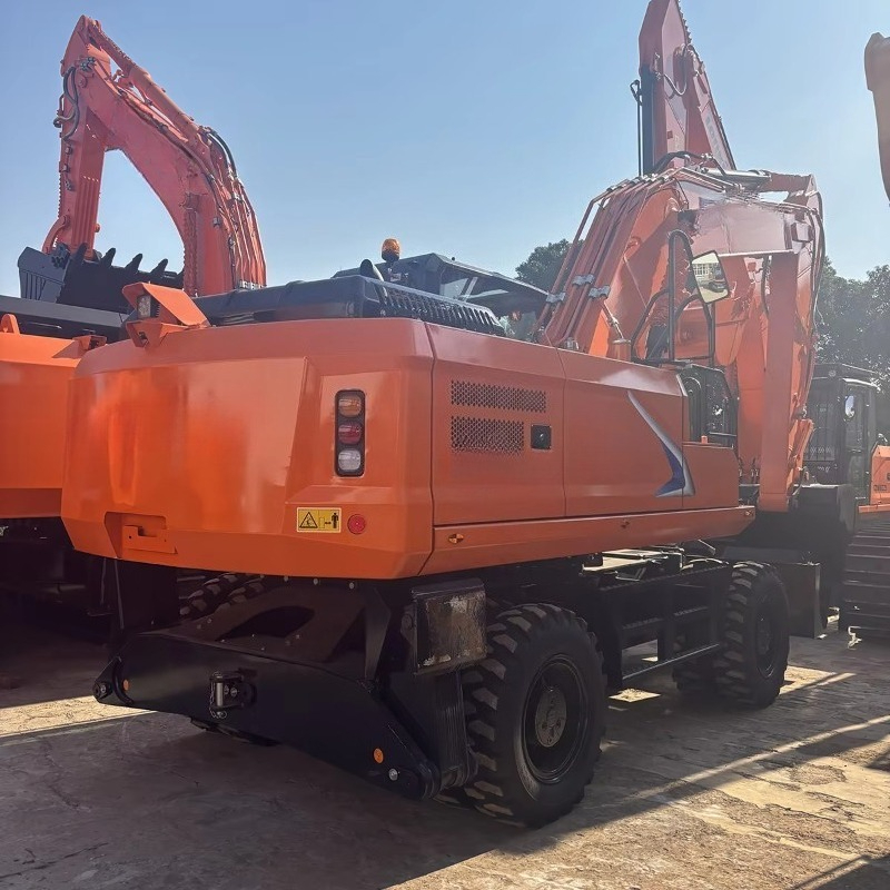 รถขุดตีนตะขาบแบบติดตั้งบนล้อ ท - Heavy Equipment Work บทวิจารณ์และราคา